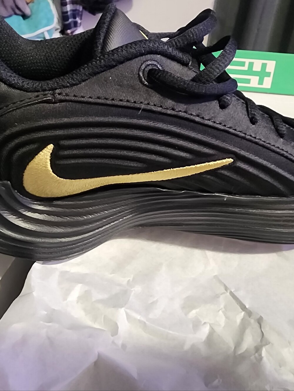 Nike Kids Black Sneakers with Gold Swoosh